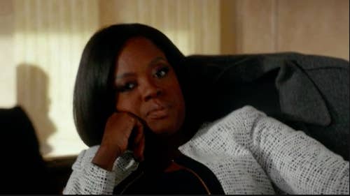 Annalise Keating from &quot;How to Get Away with Murder&quot; sitting back in her chair annoyed