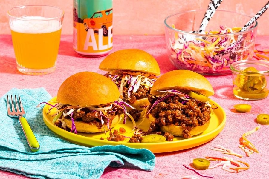 plate with three sloppy joes with cole slaw