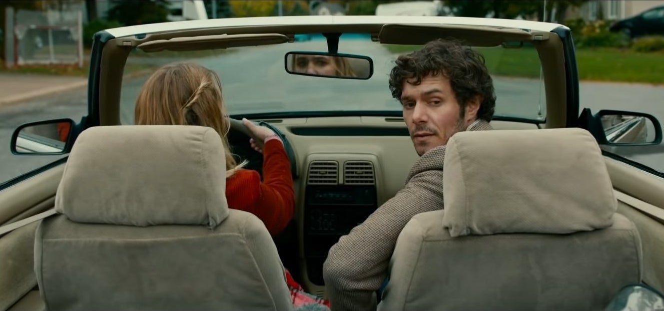(L-R) Sophie Nélisse and Adam Brody in &quot;The Kid Detective&quot;