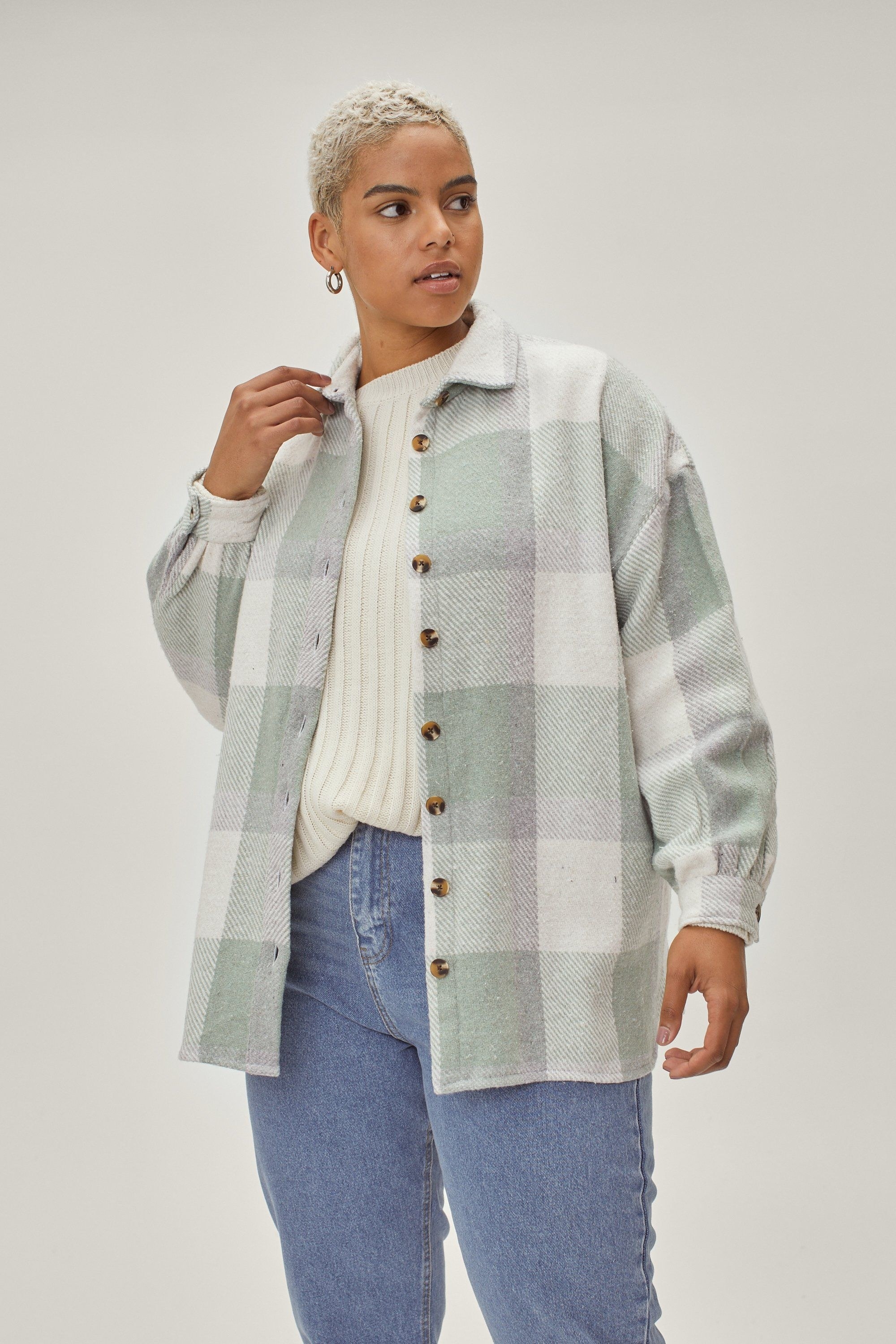 model wearing the mint and grey plaid shacket