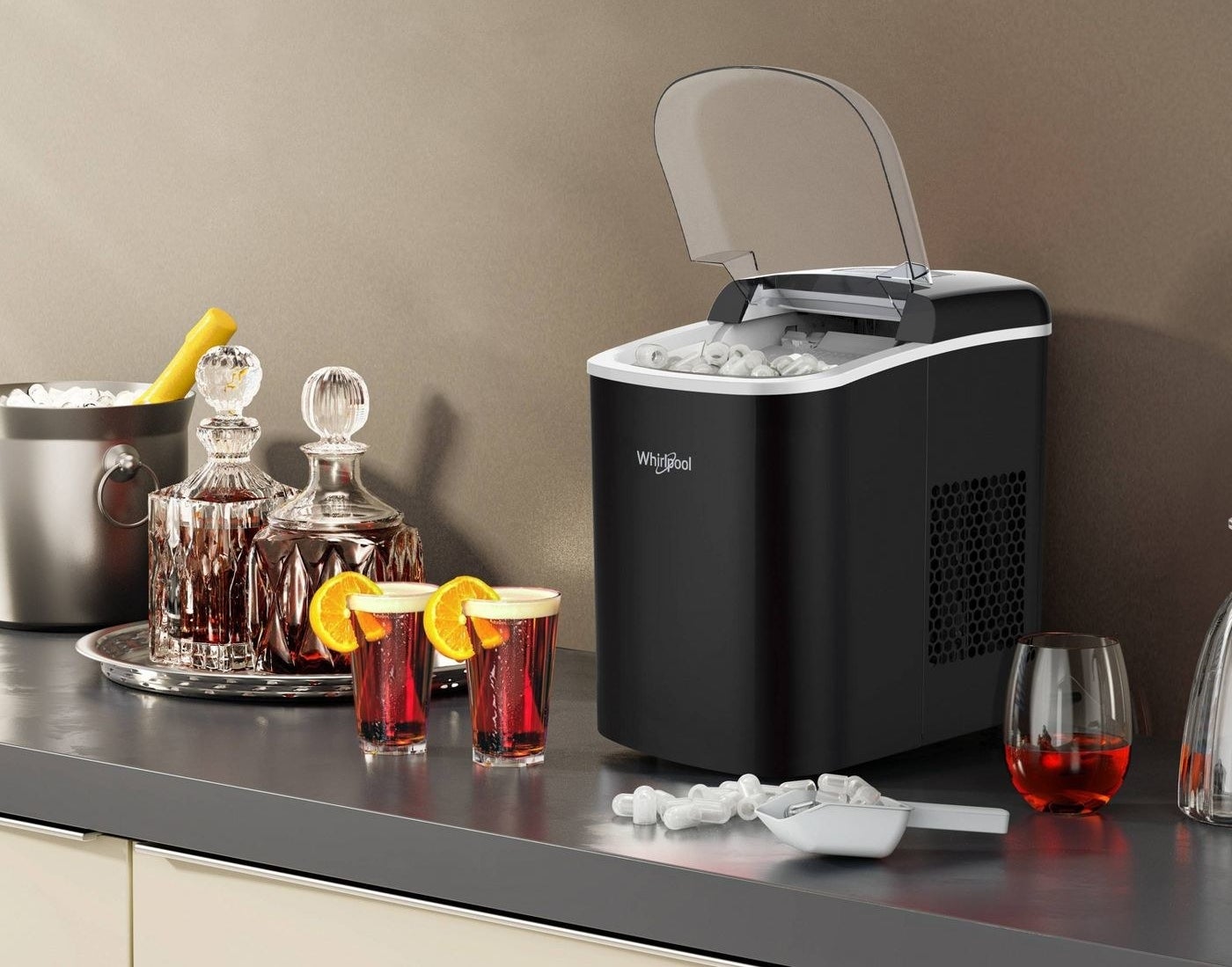 black ice maker with lid on counter