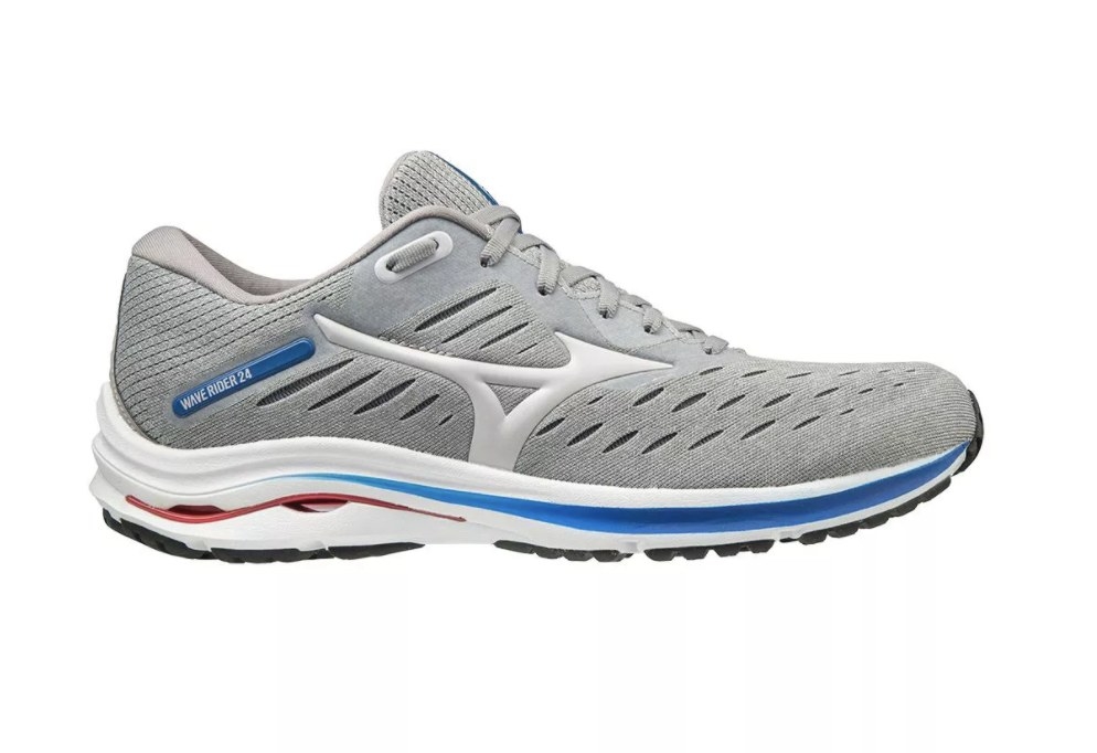 The grey sneakers have strokes of blue and red on the sole and a white design on the side of the shoe