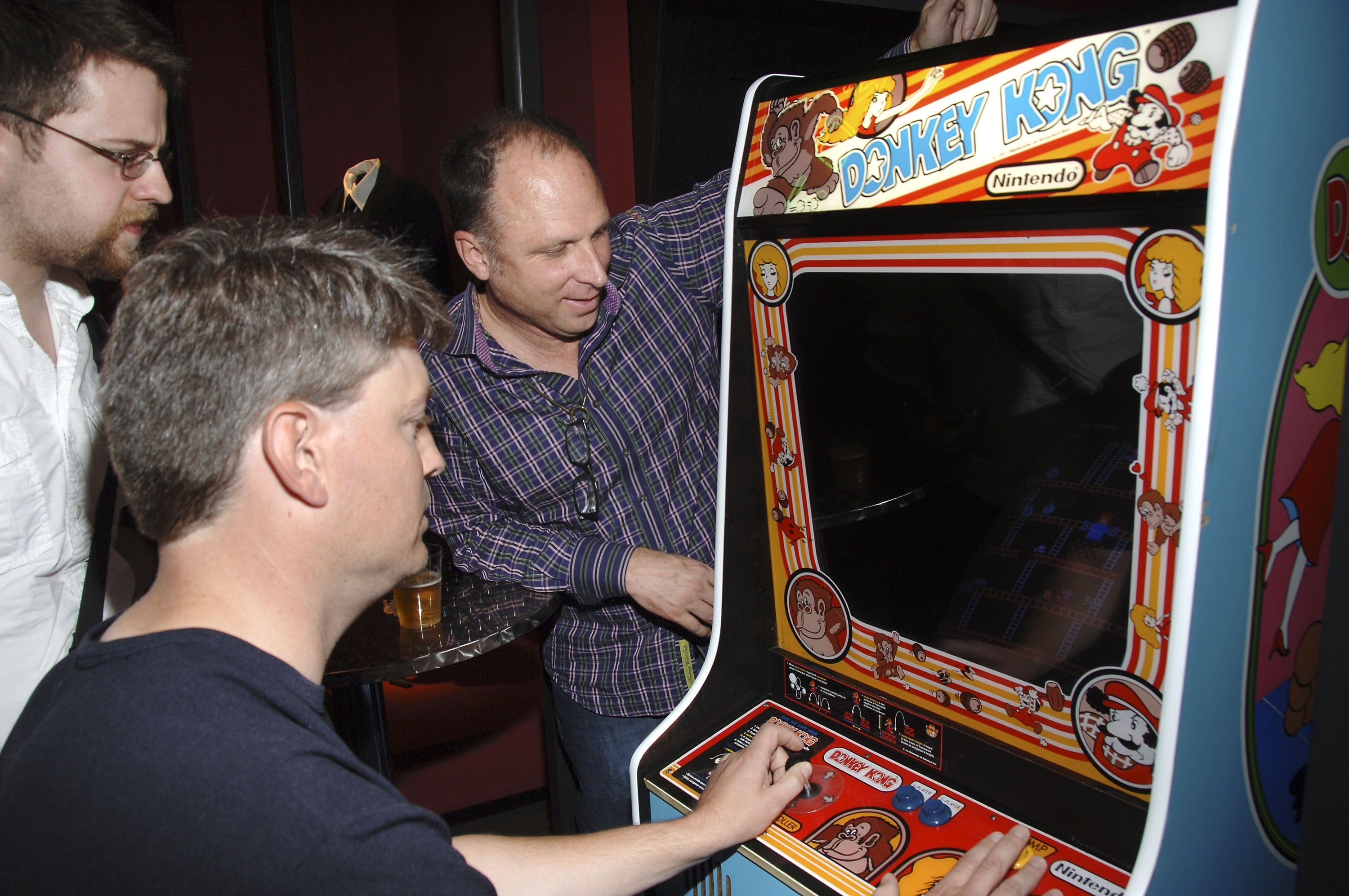 Steve Wiebe (L) plays Donkey Kong as Picturehouse president Bob Berney (R) looks on after a screening of Picturehouse&#x27;s &quot;The King of Kong: A Fistful of Quarters&quot;