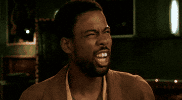 Chris Rock looking amazed