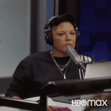 Che and Carrie recording an episode of their podcast in