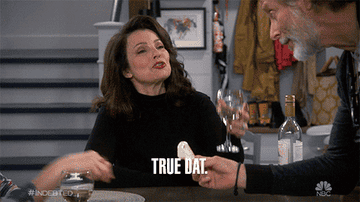 Fran Drescher holding up a glass of wine and saying &quot;True dat&quot;