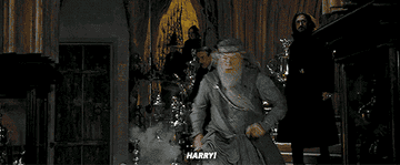 Dumbledore sprinting across towards Harry after his name came out of the Goblet of Fire.