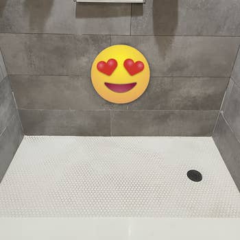 a reviewer photo of the same shower now clean with a heart-eyed emoji