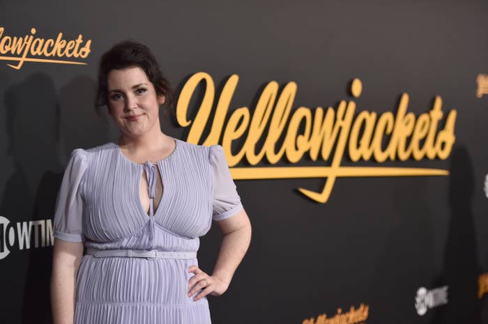Melanie poses for photographers with her hand on her hip at the premiere of Yellowjackets