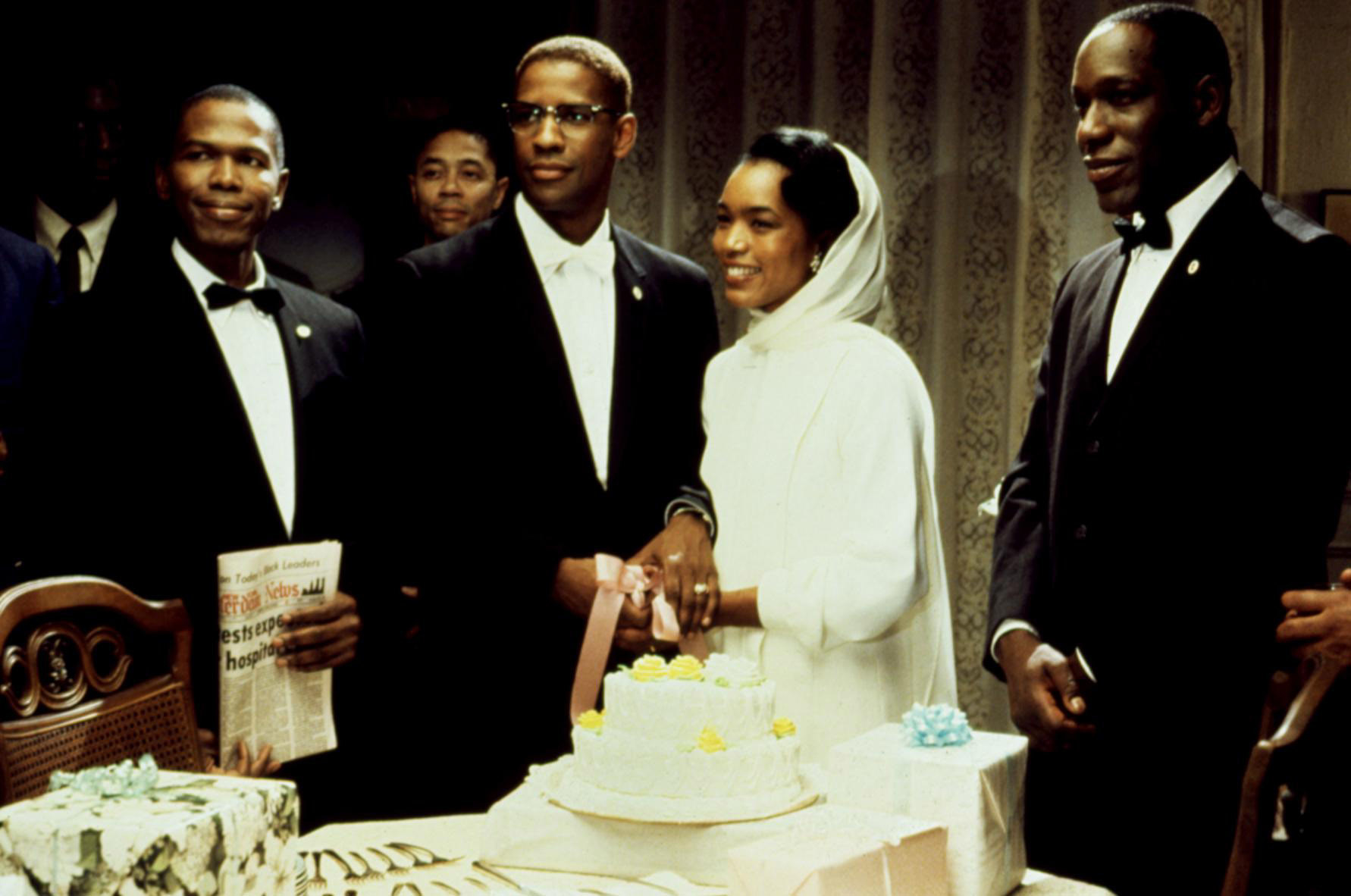 Malcolm X at his wedding celebration