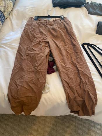 Reviewer's photo of a pair of pants before using the wrinkle release spray