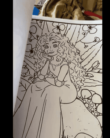 GIF of reviewer flipping through pages of the coloring book