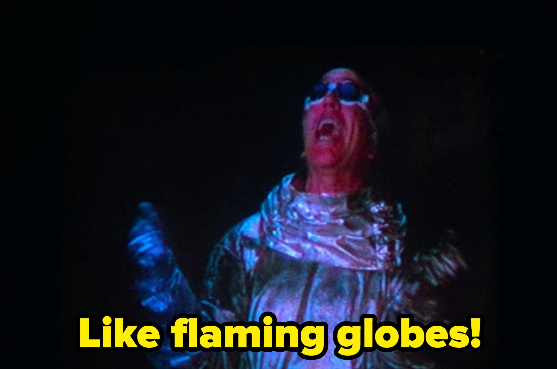 Larry David dressed as a science-fiction character on TV in "Seinfeld"