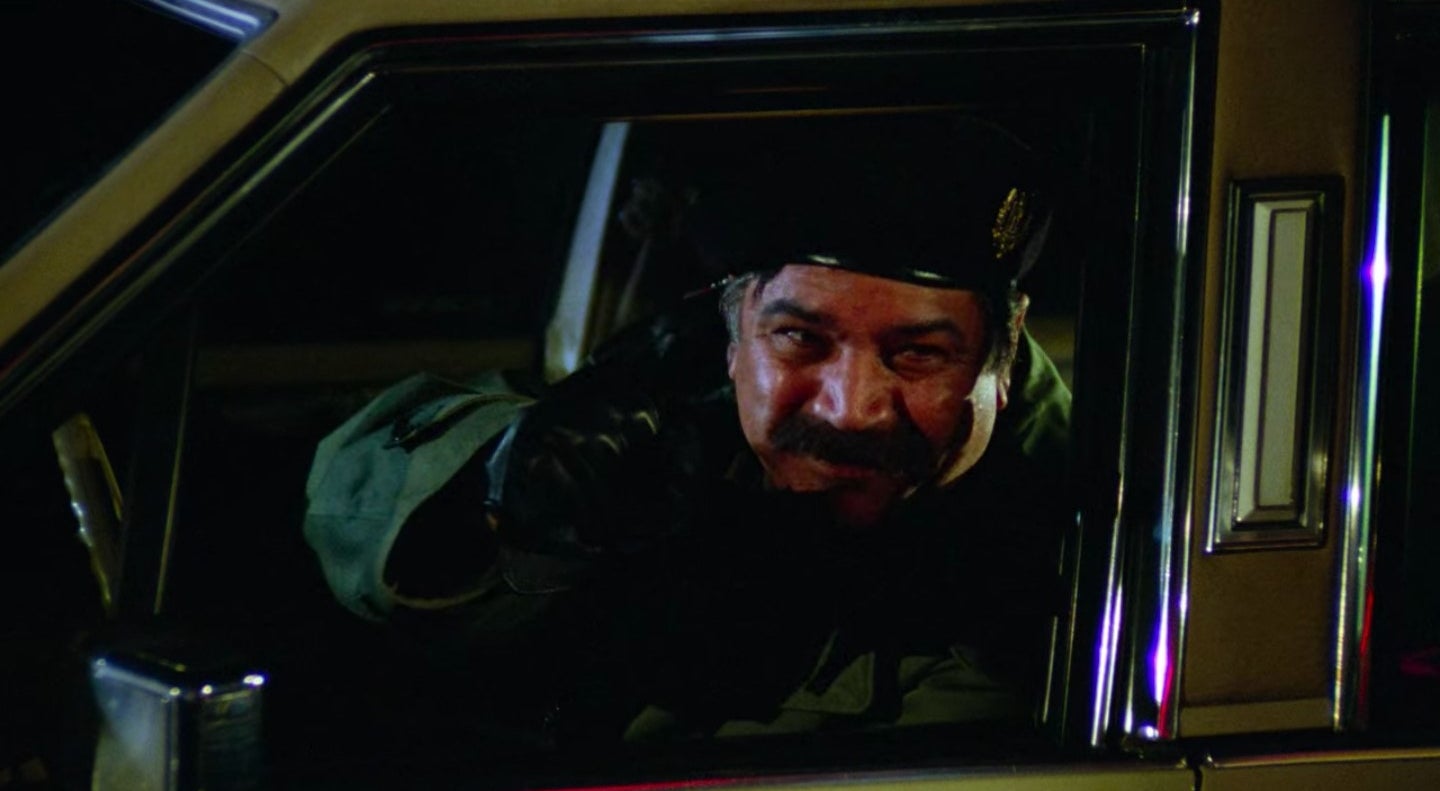 A man resembling Saddam Hussein in a car in &quot;Seinfeld&quot;