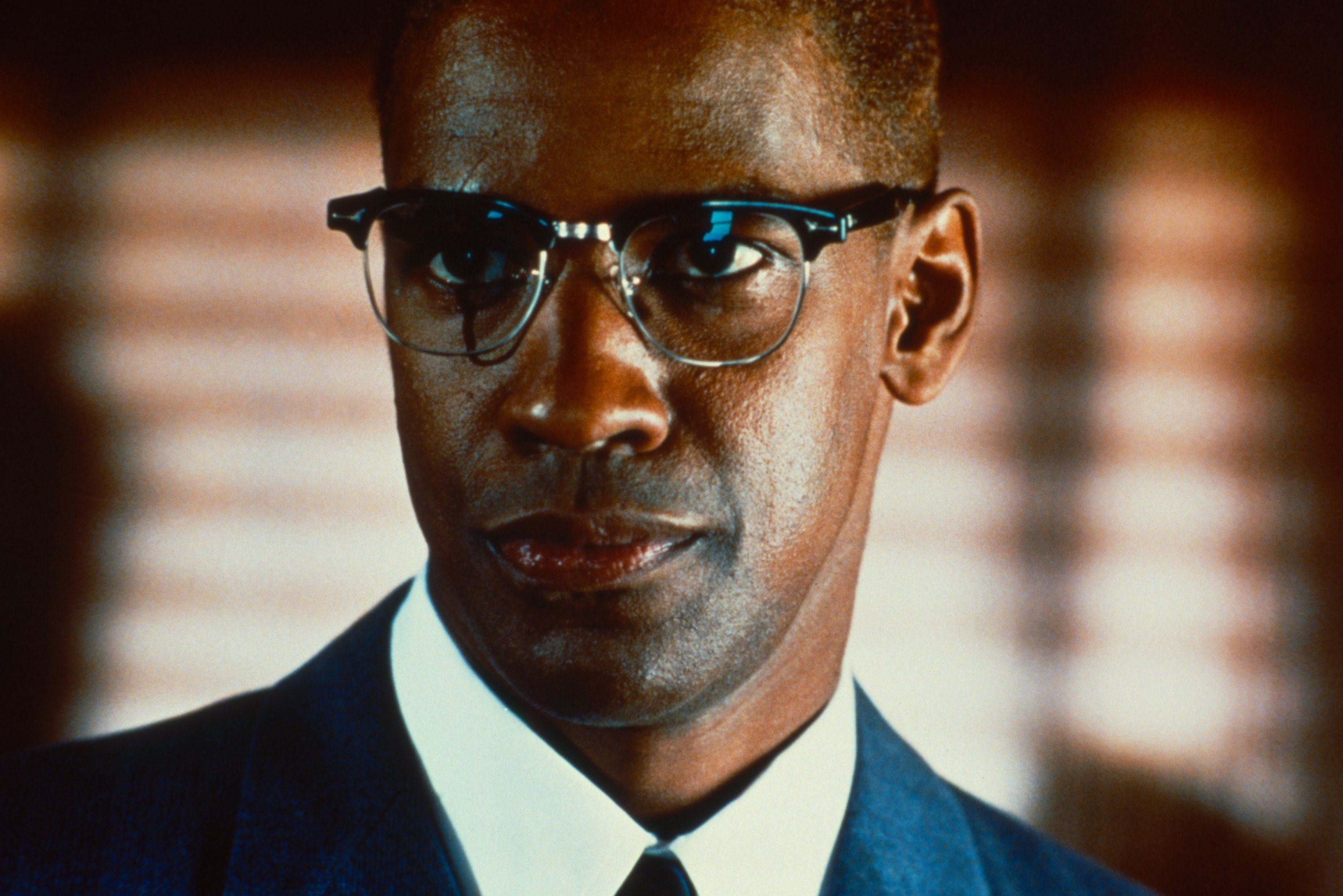 Denzel Washington as Malcolm X