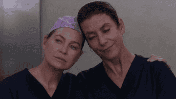 Meredith and Addison walking out of the elevator together