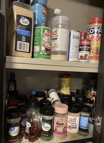 spice cupboard untidy and unorganized
