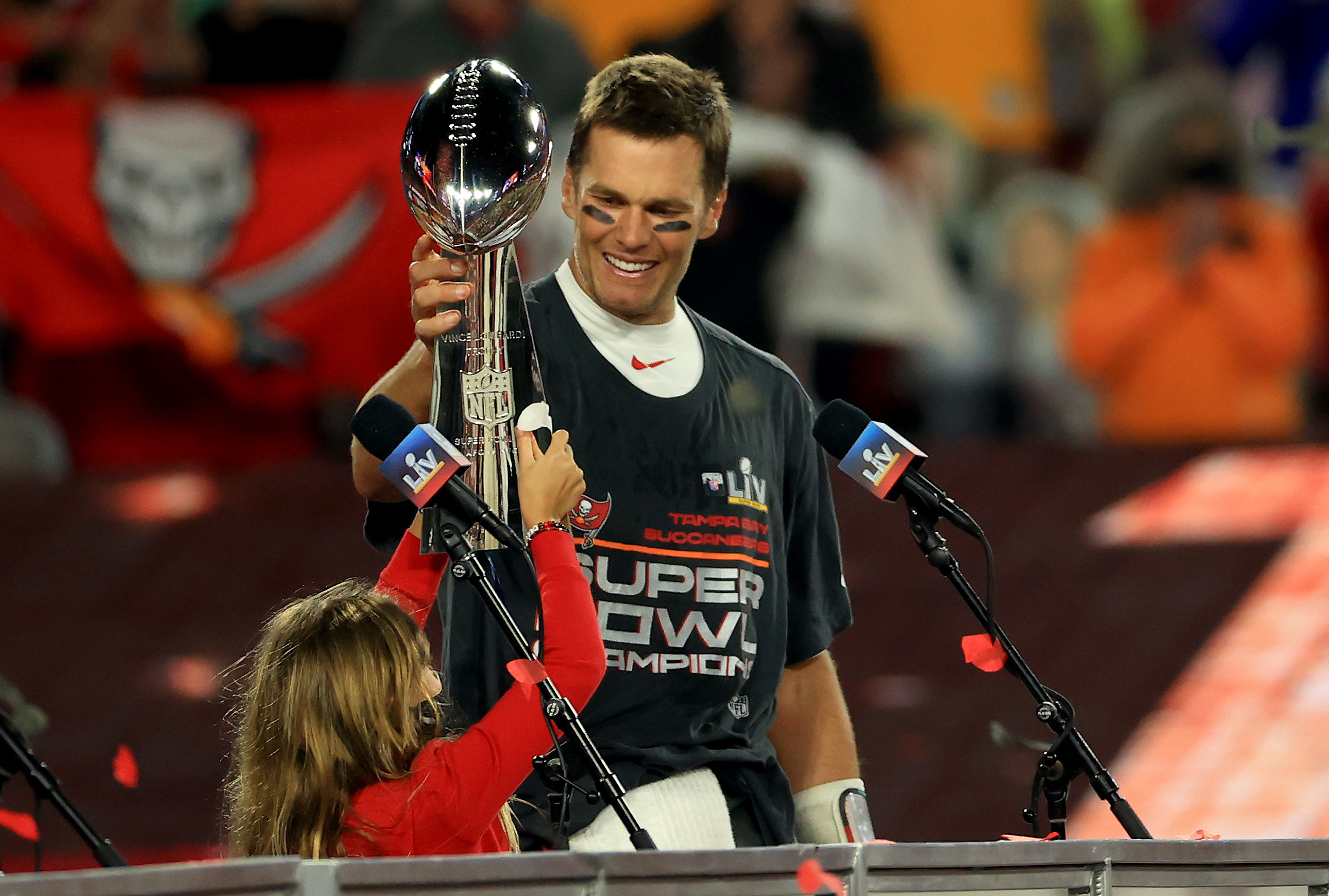 Tom Brady holds Lombardi Trophy