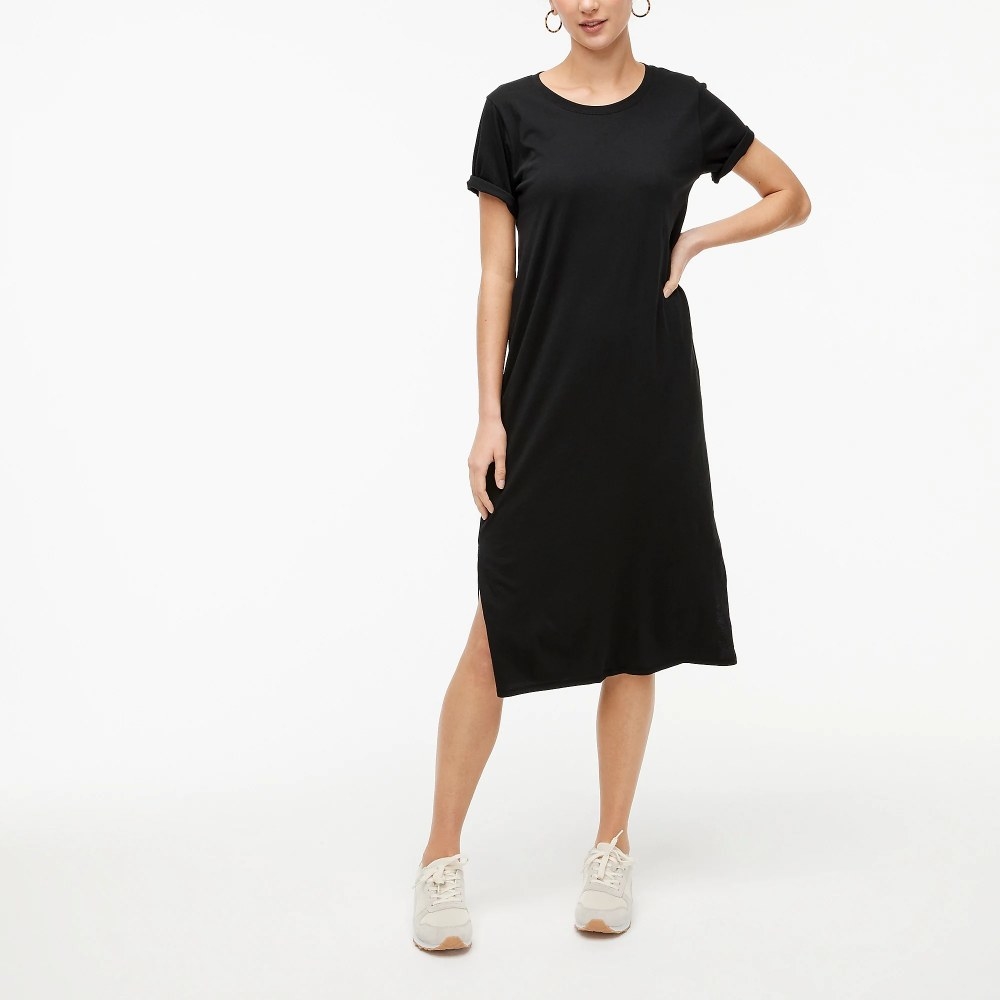 Model wearing the t-shirt dress in the color Black