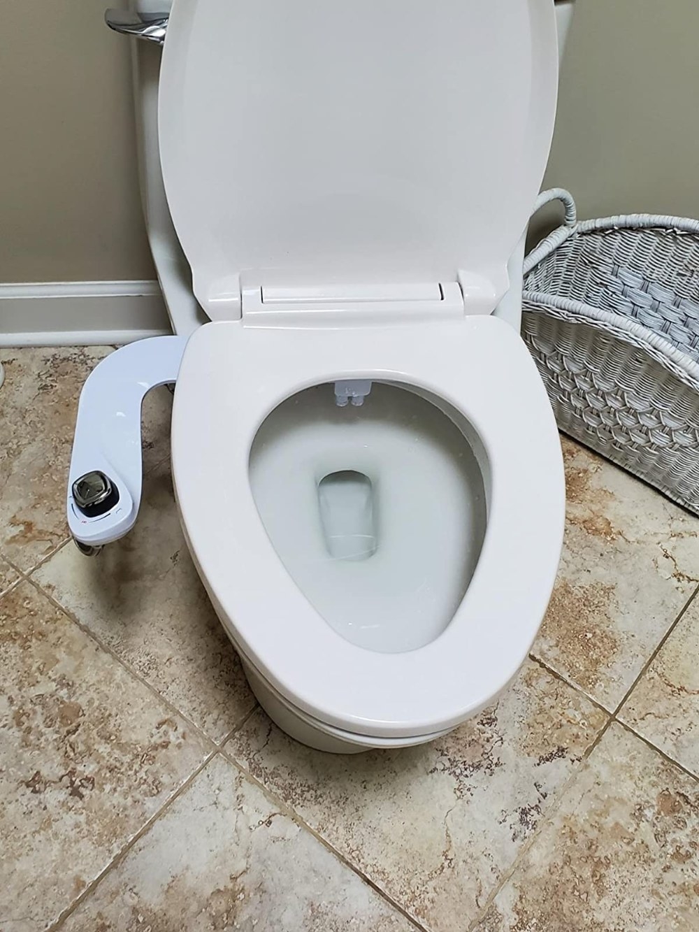 Reviewer&#x27;s photo of the bidet attachment, installed