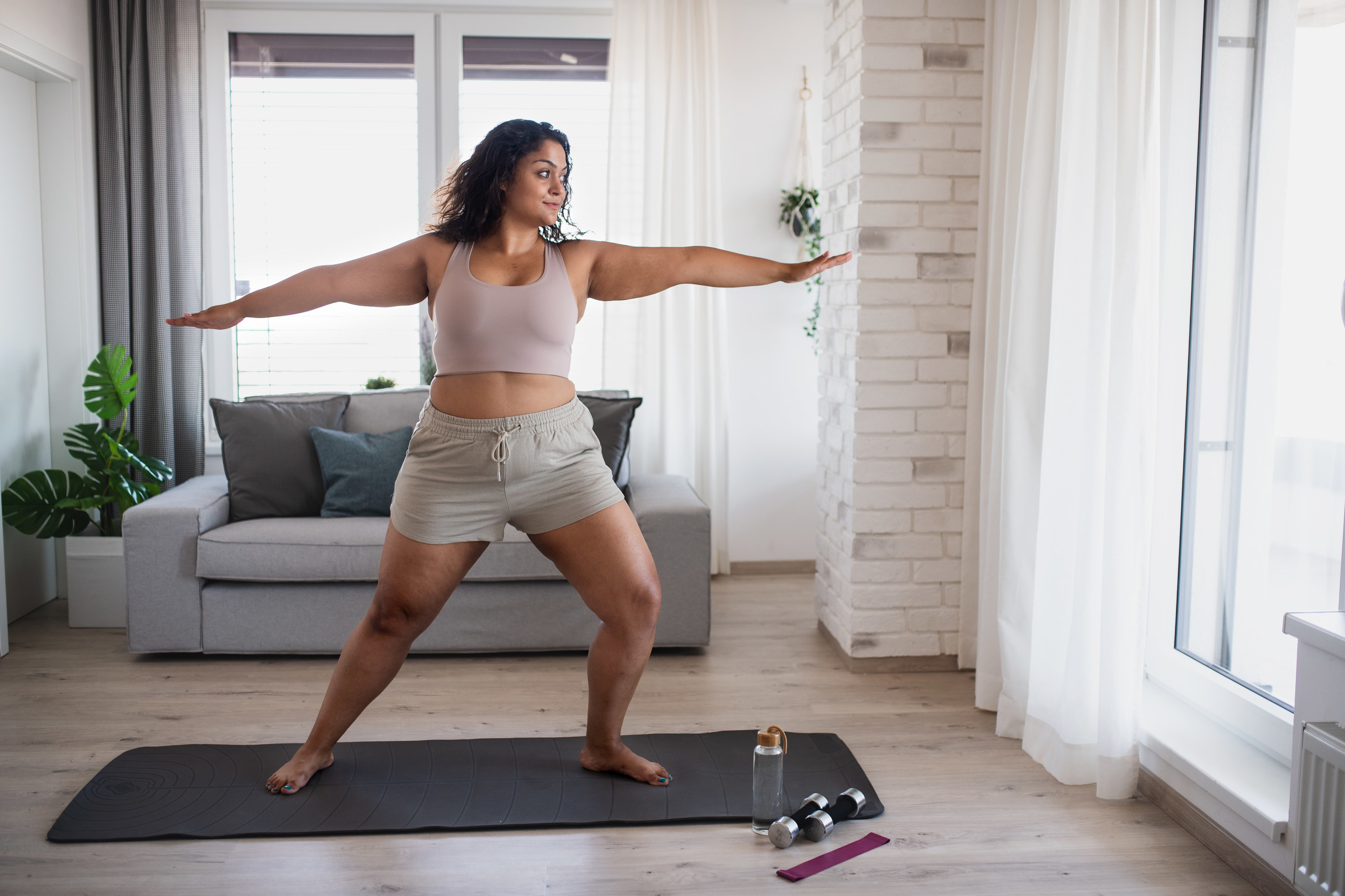 Woman doing yoga at home