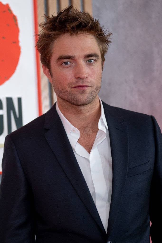 Robert in a suit at a red carpet event