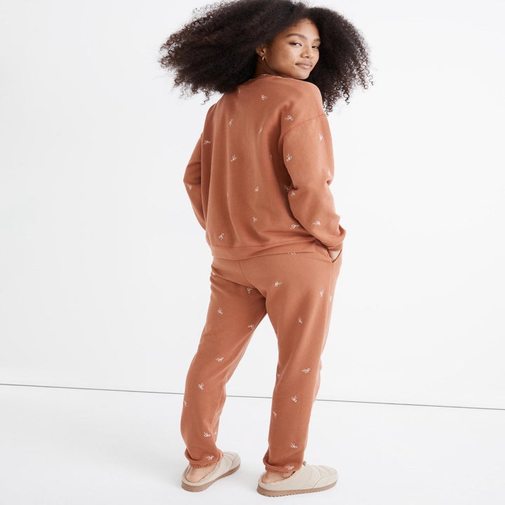 back view of model wearing the pullover