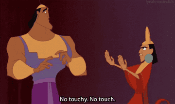 The Emperor&#x27;s New Groove: Emperor Kuzco is throwing up karate hands at Kronk, warning him to stay back