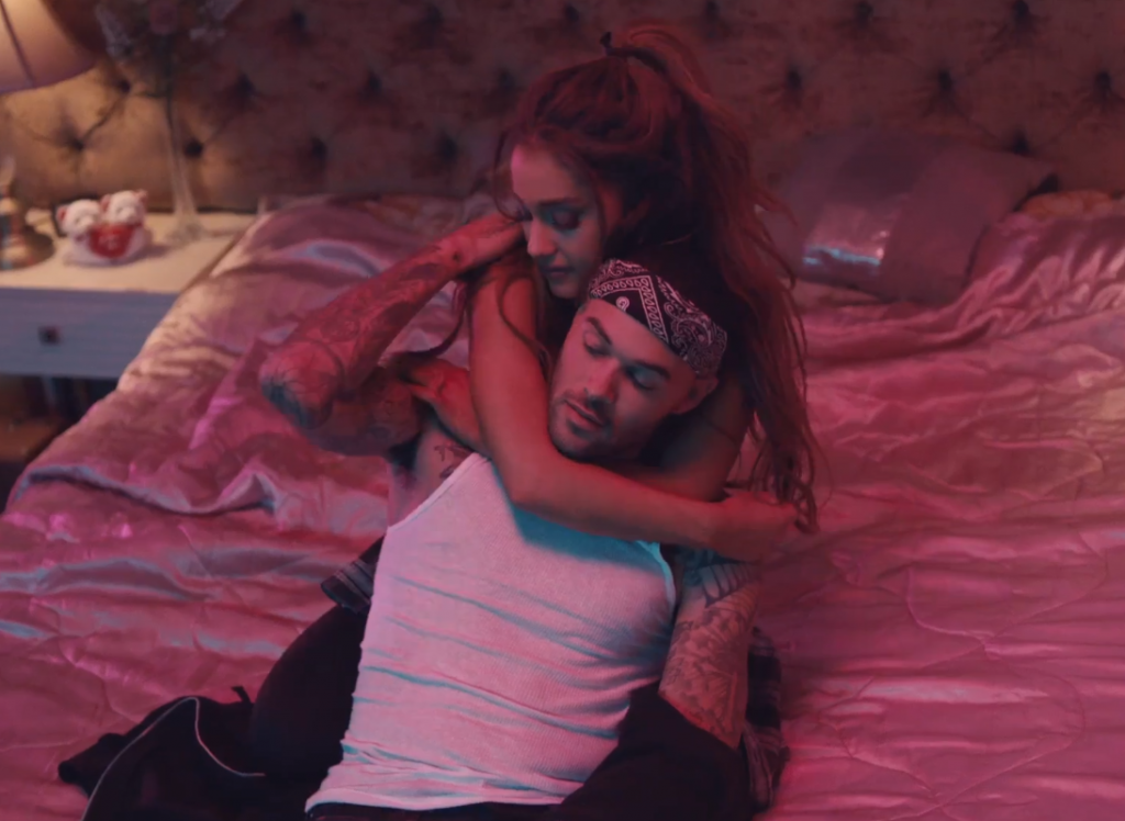 Ariana Grande cuddling Don Benjamin in a hotel room