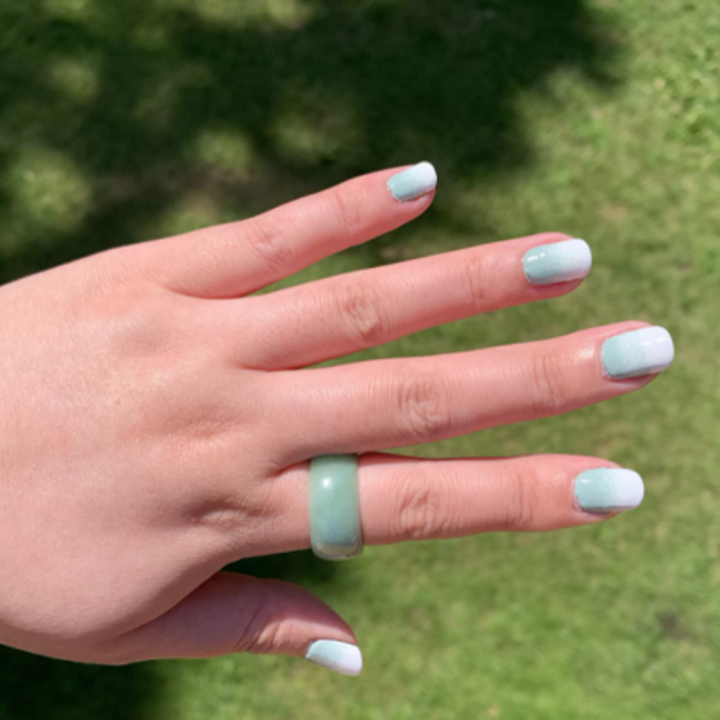 reviewer nails that came out with clean cuticles after using latex tape