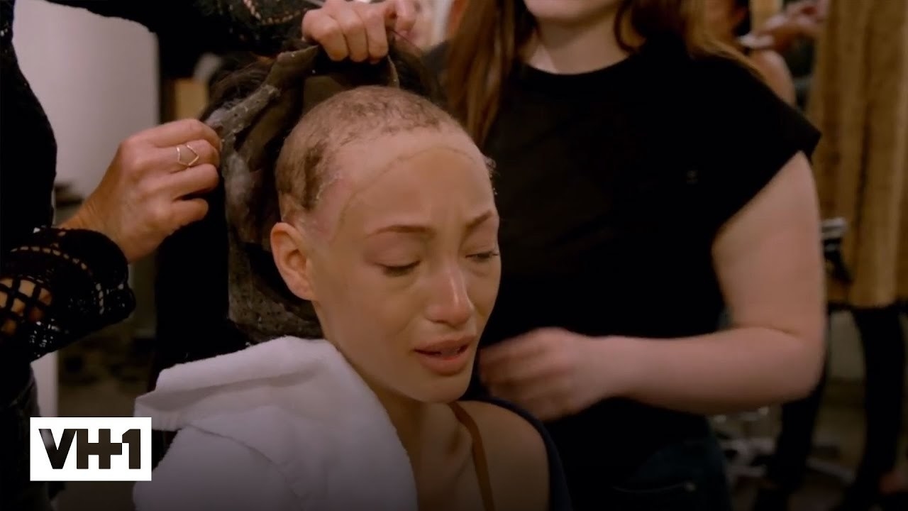 A hairdresser removing Jeana&#x27;s wig