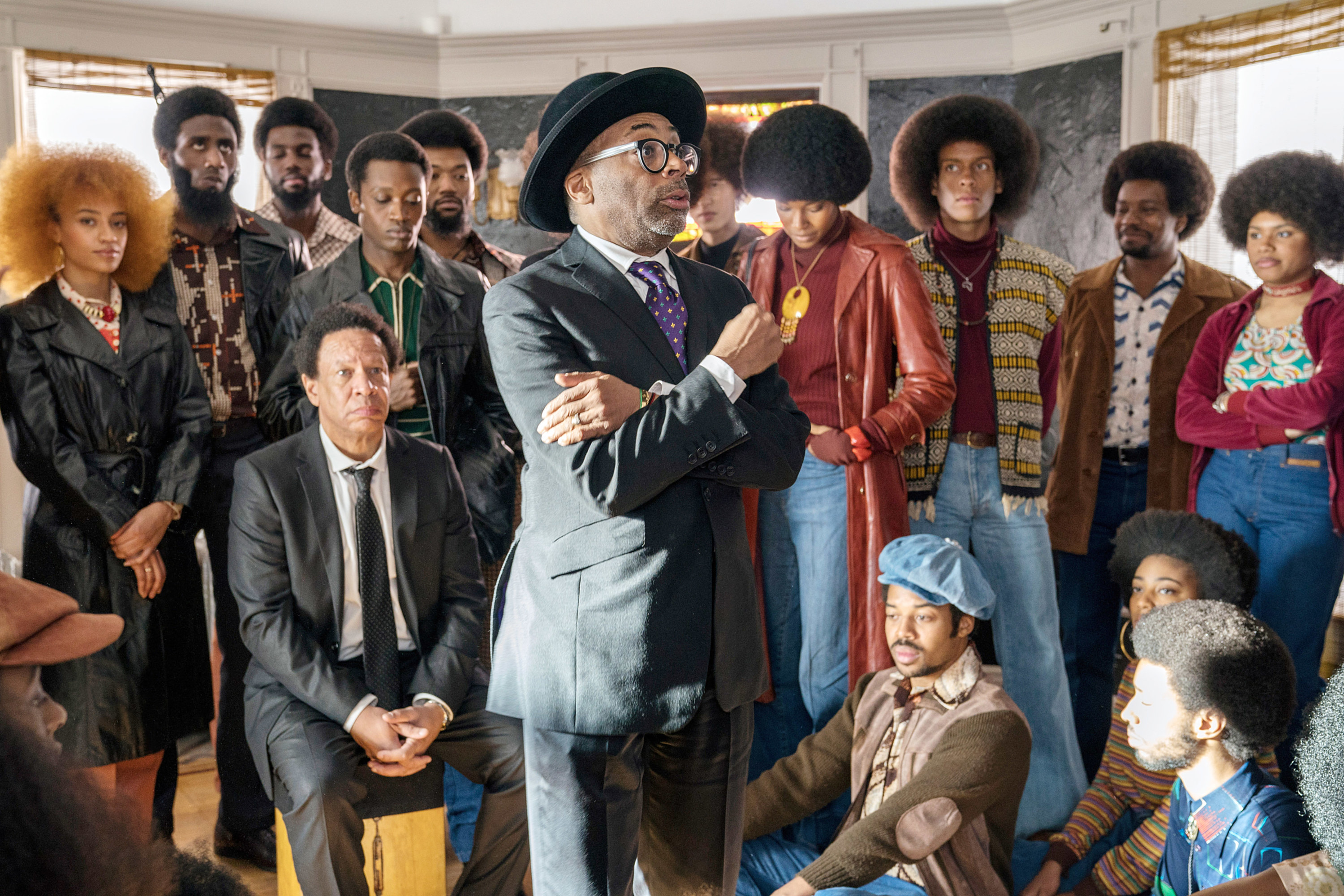 Spike Lee surrounded by members of the cast