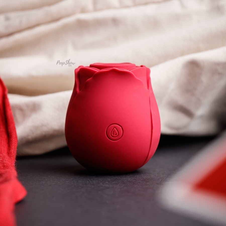 Red rose-shaped vibrator