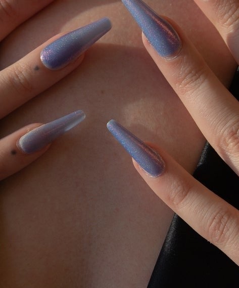 model wearing the pearl ring with red chili pepper charm