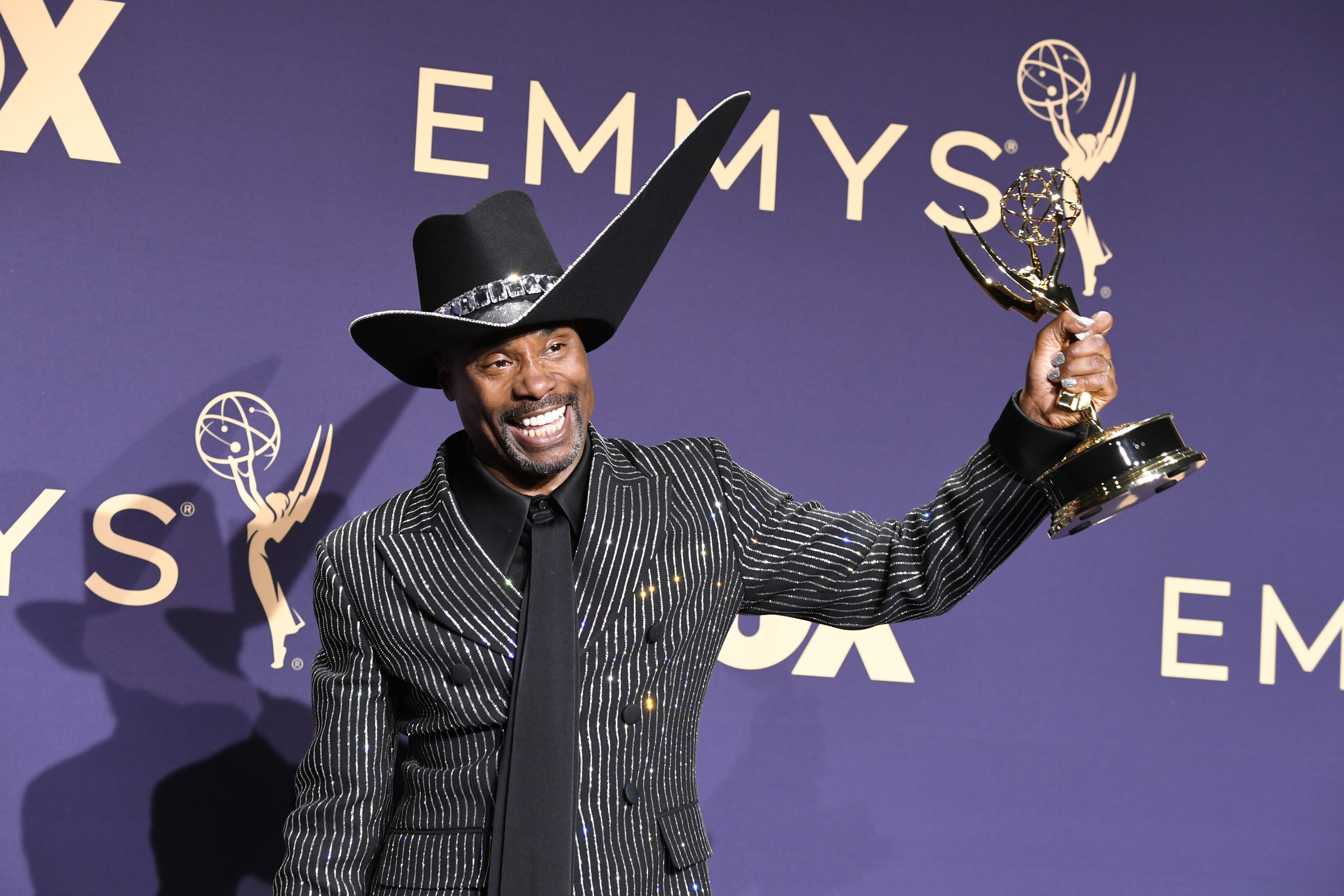 Billy Porter poses with his award at the 2019 Emmys
