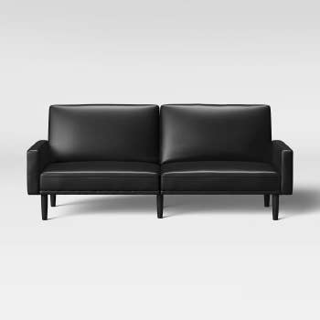 a faux leather futon sofa
