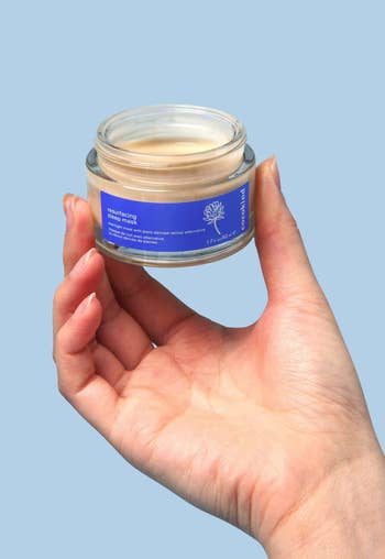an open jar of the face mask