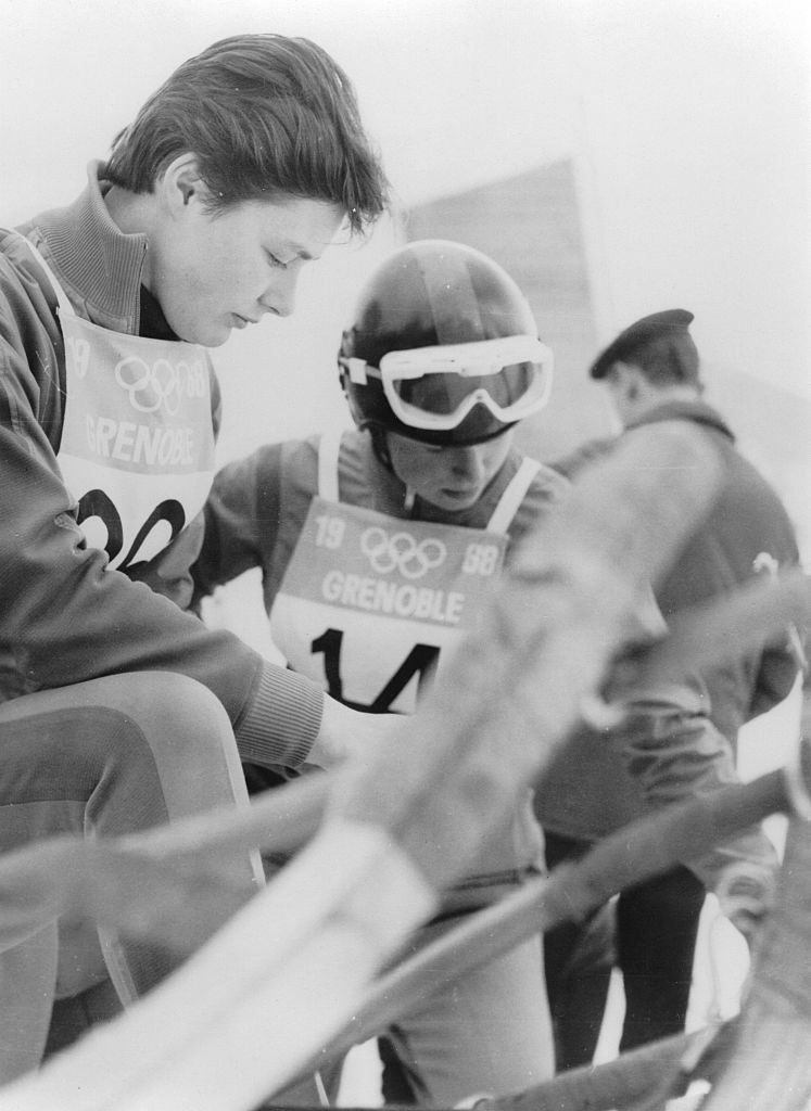 Women cleaning off their luge