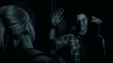 Rami Malek&#x27;s character high-fiving another character in &quot;Until Dawn&quot;