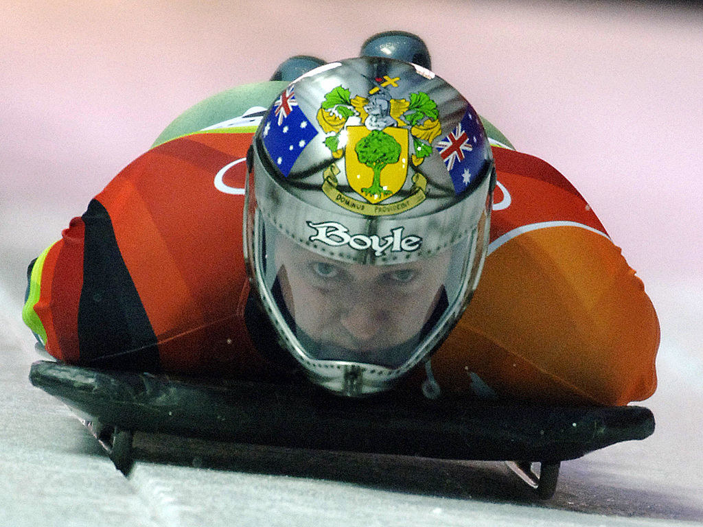 Shaun&#x27;s helmet features a coat of arms and the Australian flag on either side