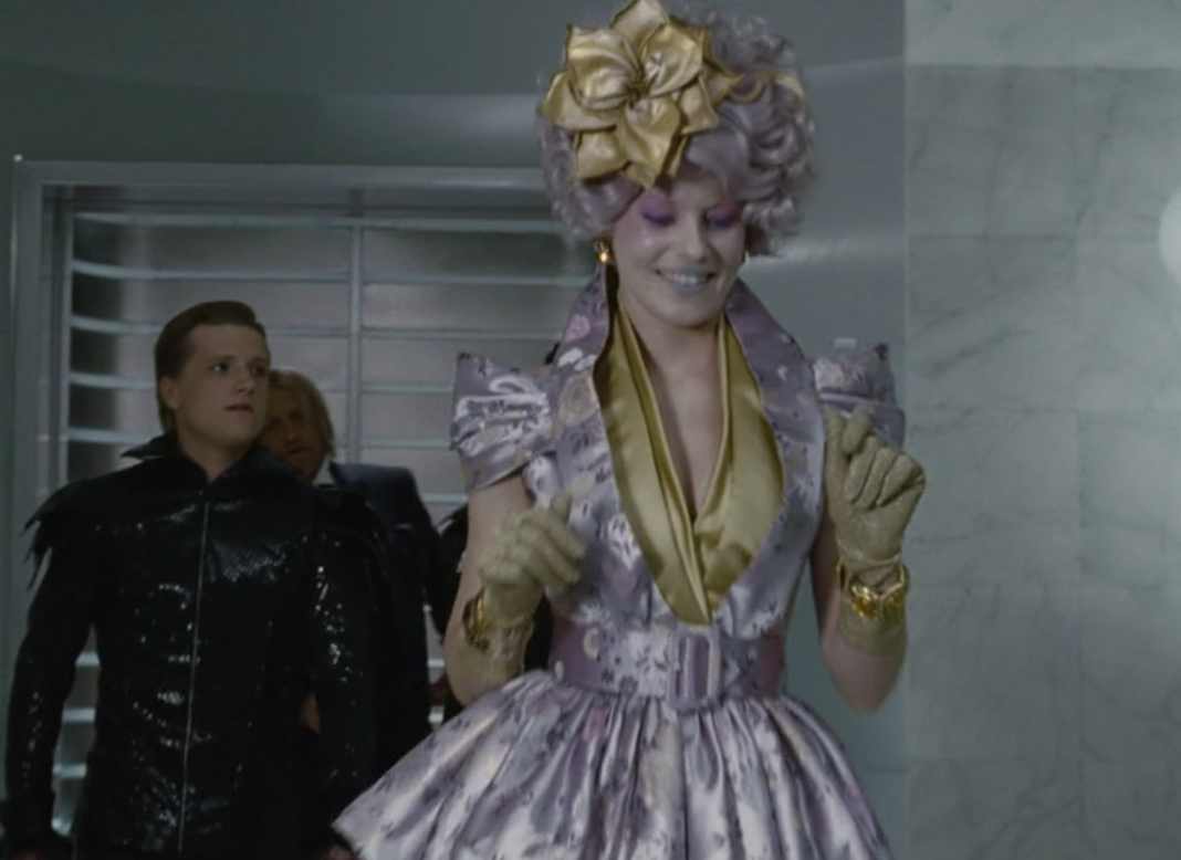 A close-up of Effie&#x27;s belted peplum outfit
