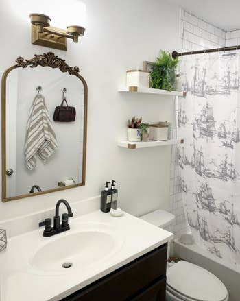 reviewer's bathroom with mirror over the sink