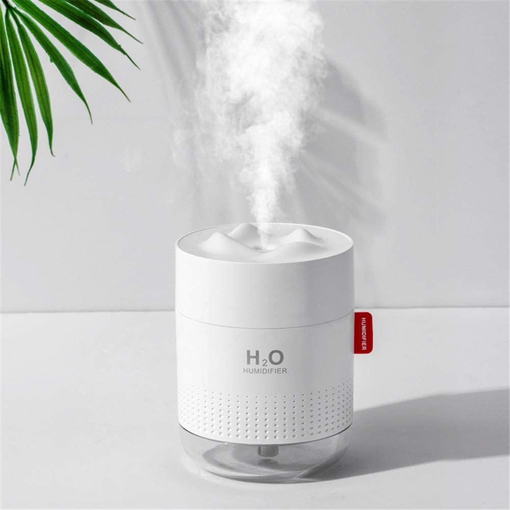 a petite humidifier blowing out cool mist