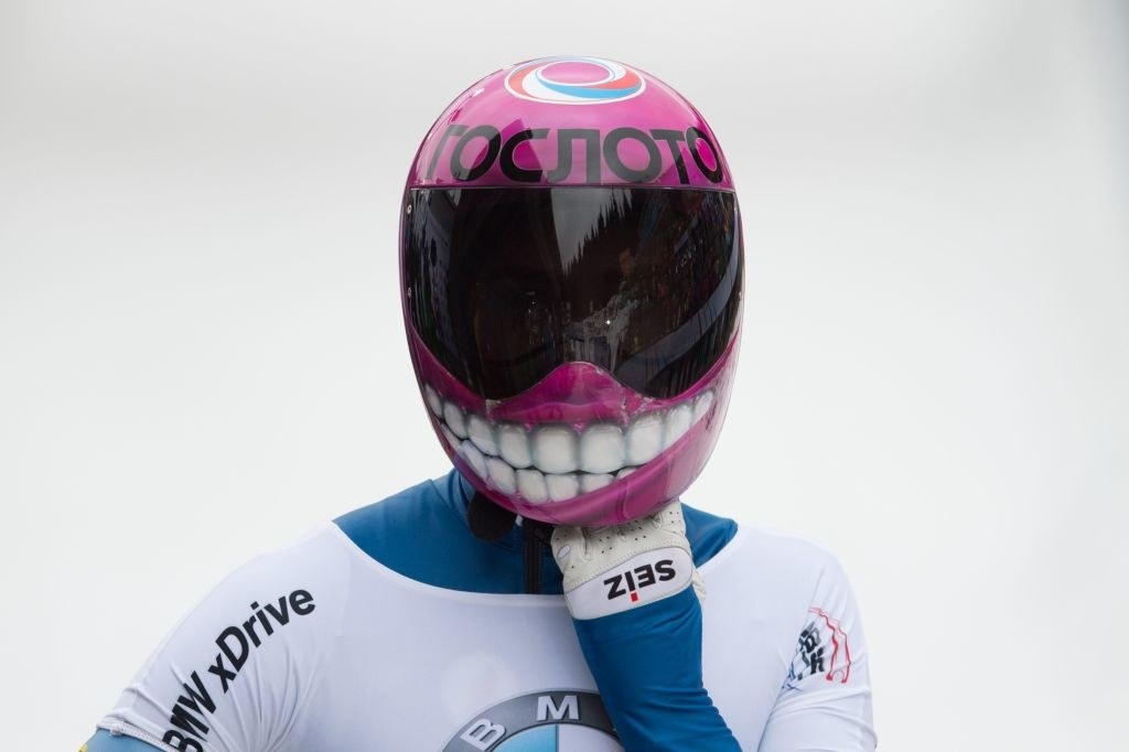 Elena&#x27;s helmet is painted to look like a head with a wide smile showing off teeth