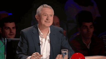 Louis Walsh nodding head whilst sitting on a panel for Britain&#x27;s Got Talent
