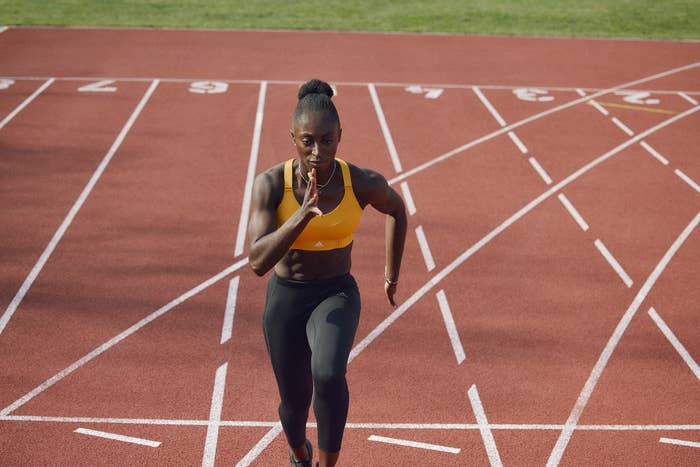 woman running a track