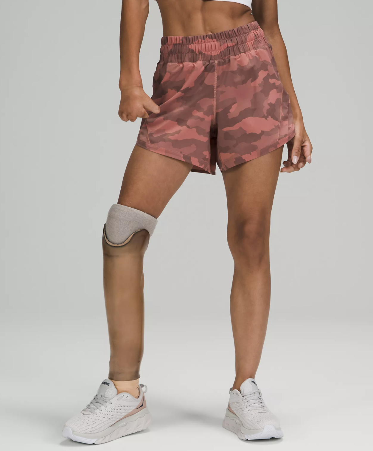 Model wearing pink camo shorts