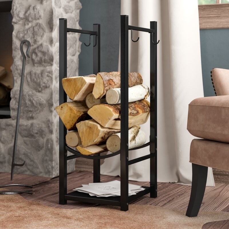 The log rack next to a fireplace