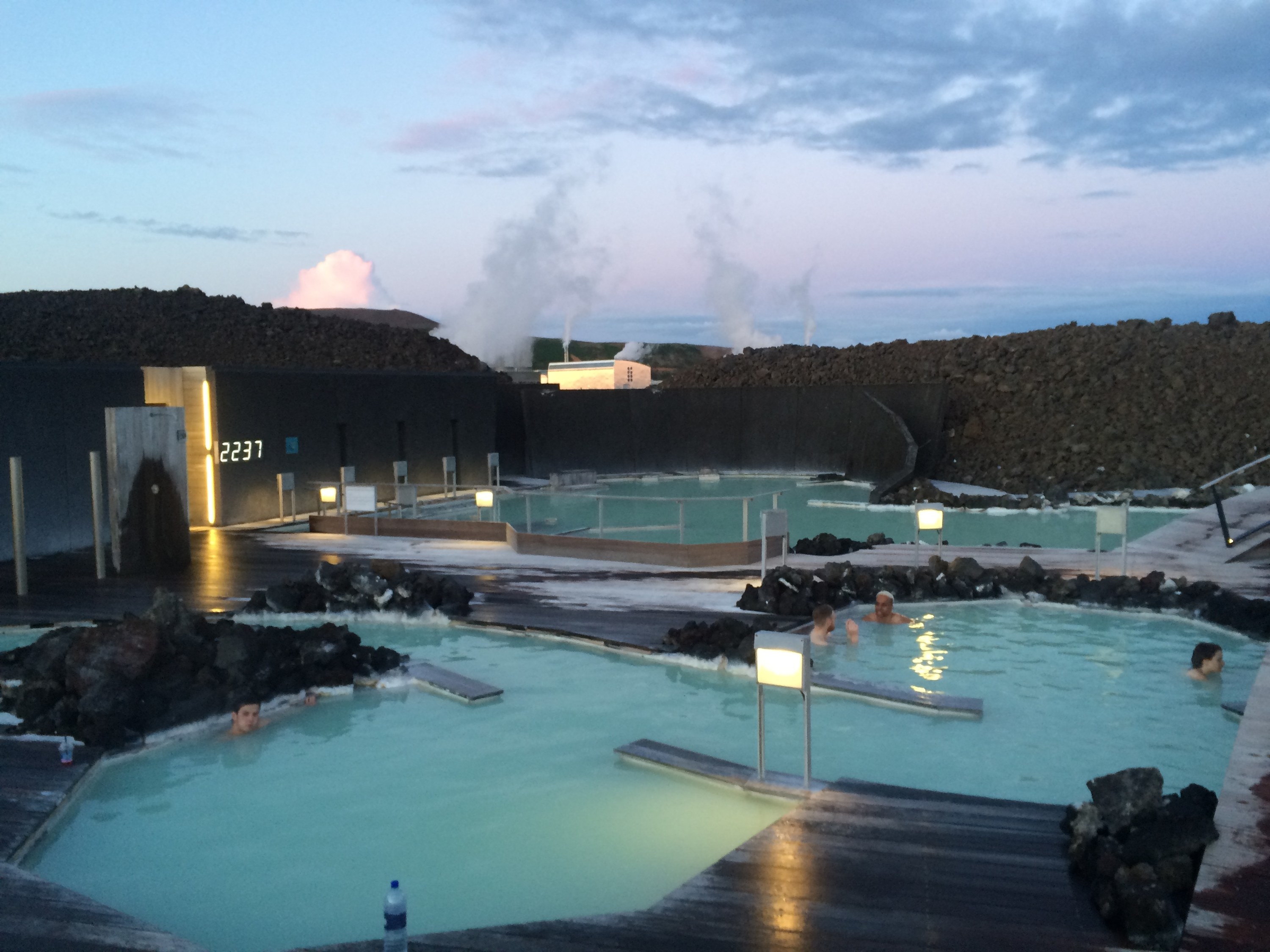 A sprawling series of geothermal spas with a few people in them