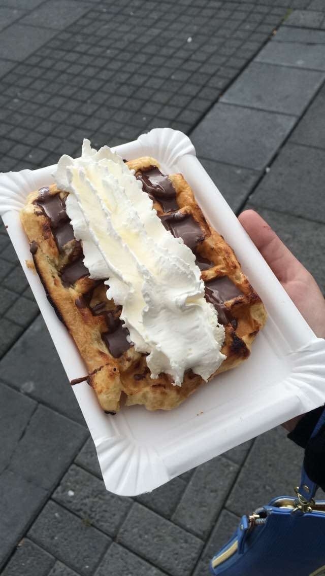 waffle with chocolate sauce and whipped cream